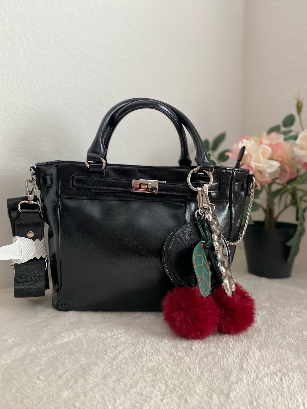 Madden Girl Black Satchel with Burgundy Pom Charm